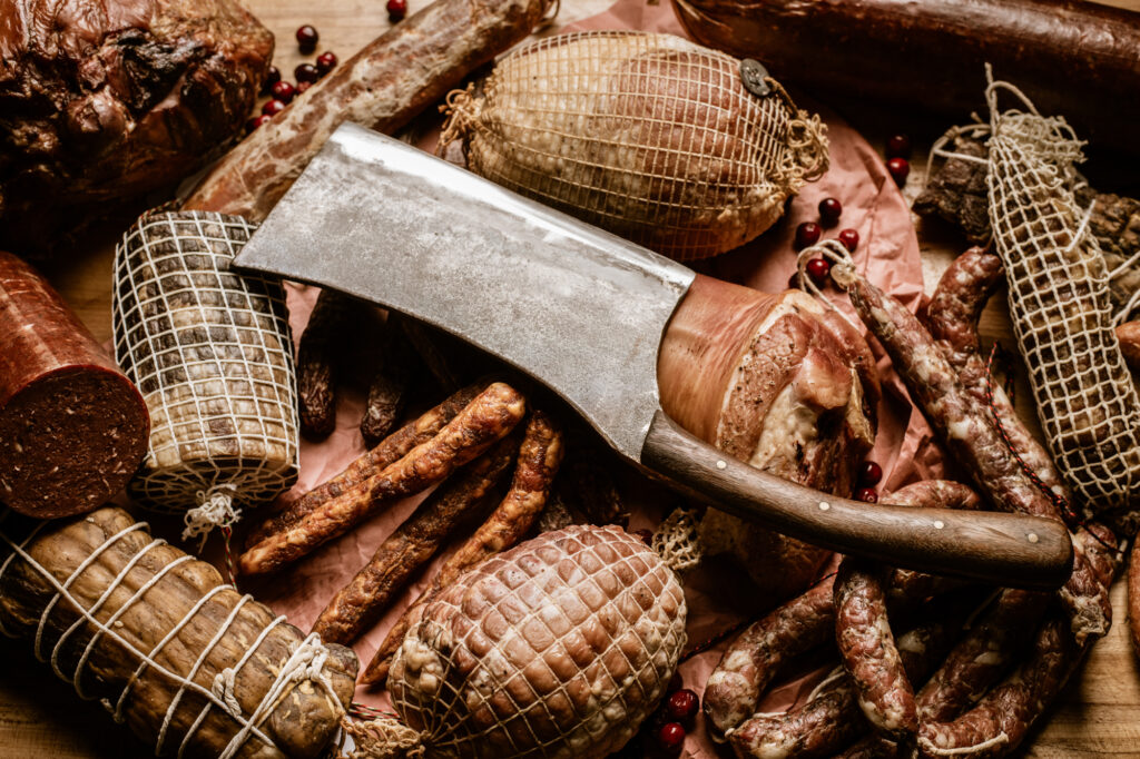 smoked meats with cleaver